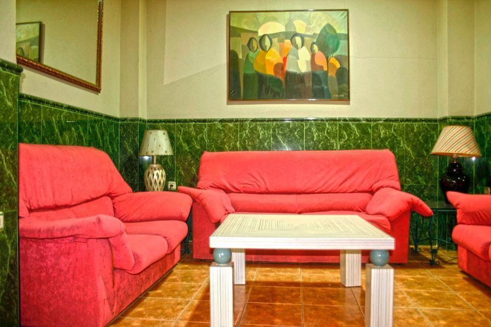 מאלגה Hostal La Casa De Enfrente מראה חיצוני תמונה
